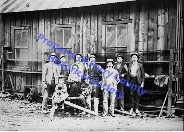 Group of Miners with children at an unknown mine