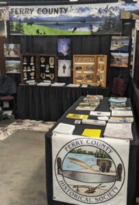 The Ferry County Historical Society table in the Stonerose booth at the Spokane Outdoor Show Feb. 17-18.